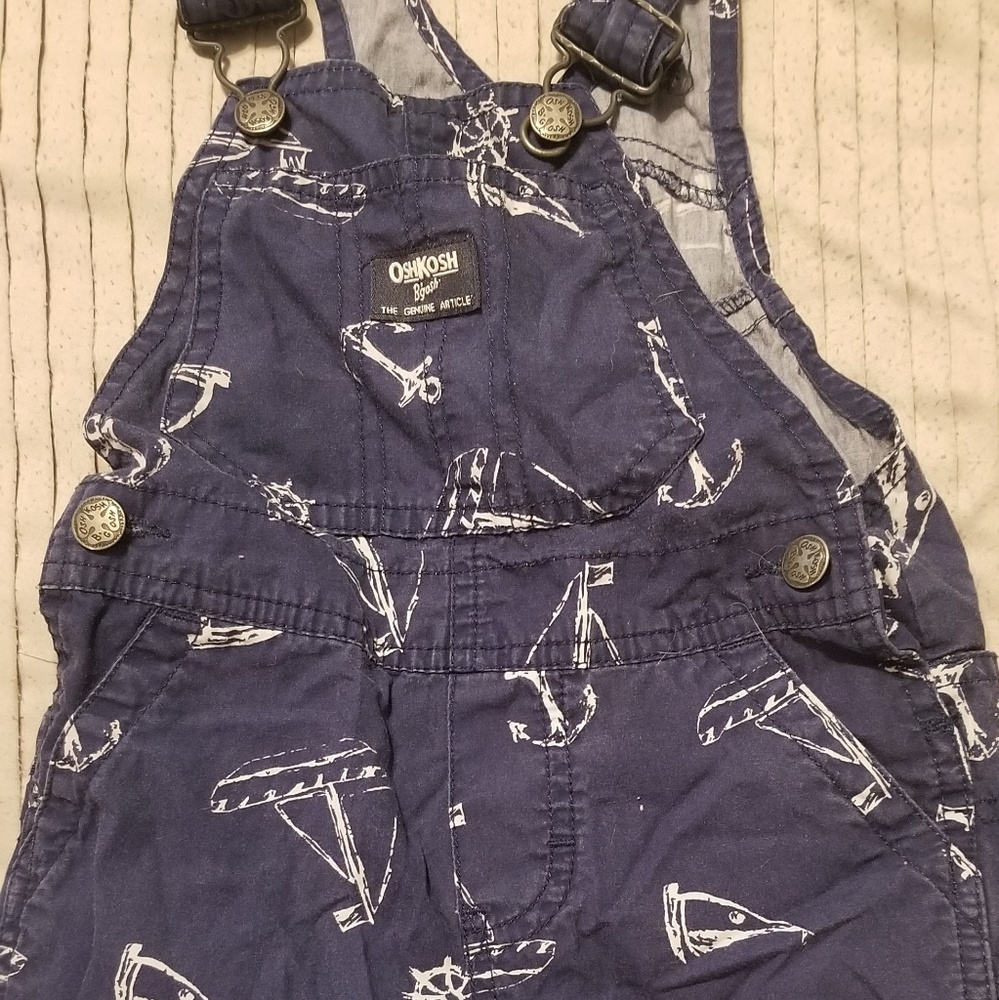 Blue and white oshkosh overalls